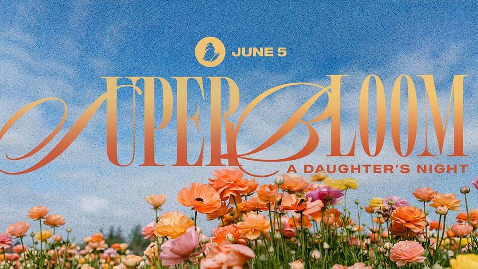 A vibrant event graphic featuring a field of orange and pink flowers under a bright blue sky, with elegant stylized text reading “Super Bloom” and smaller text “A Daughter’s Night,” along with the date June 5 displayed above.
